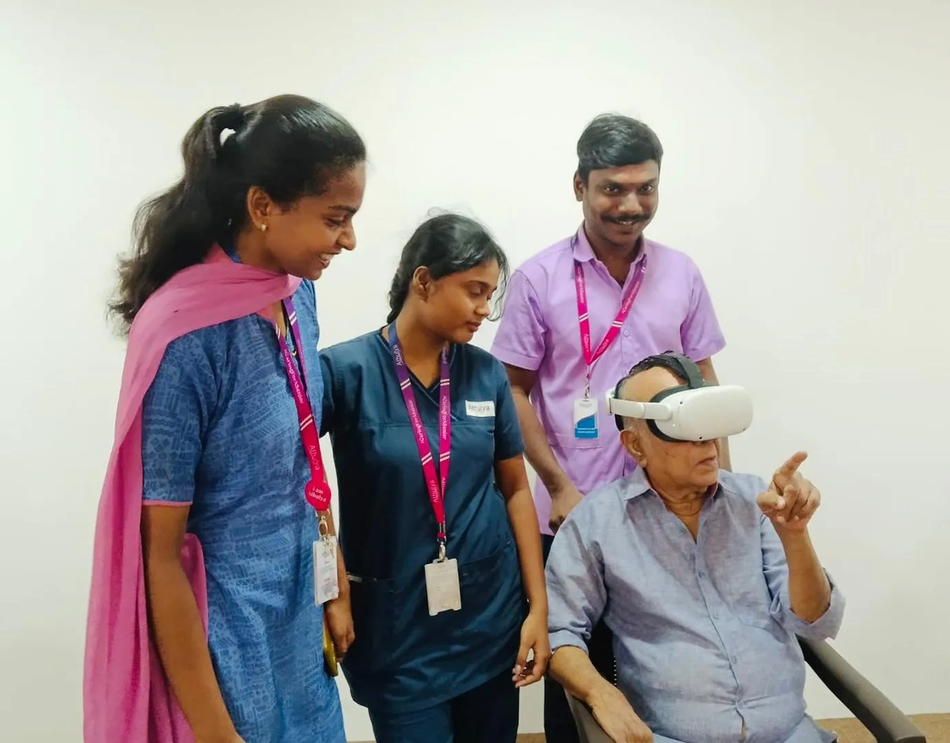 A patient using Rewin VR therapy alongside Rewin therapists